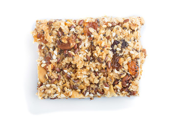 Homemade granola from oat flakes, dates, dried apricots, raisins, nuts isolated on white background. top view.