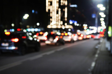 Defocused picture of a night street car traffic