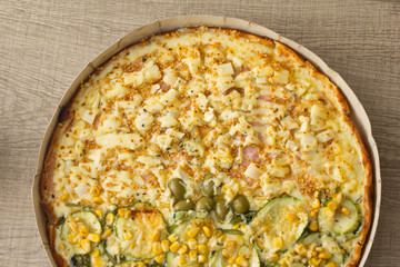 Food plate of pizza. Dish showing italian typical recipe. On rustic wooden table.