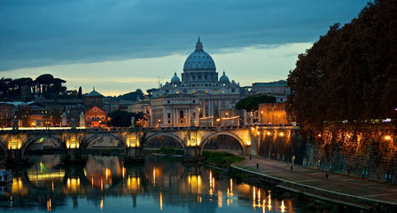 Fototapeta na wymiar San Pietro dome in Rome Italy at sunset