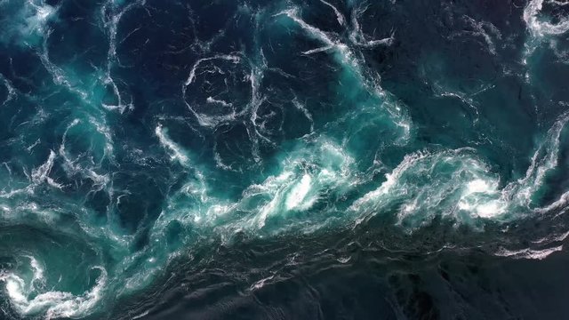 Waves of water of the river and the sea meet each other during high tide and low tide.