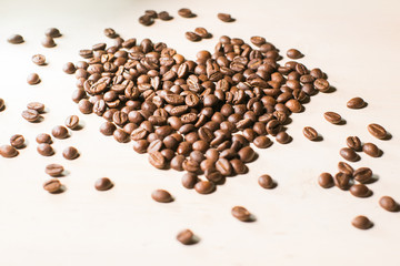 coffee beans arranged in the shape of a heart