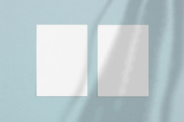 Blank white vertical paper sheet 5x7 inches with shadow overlay. Modern and stylish greeting card...