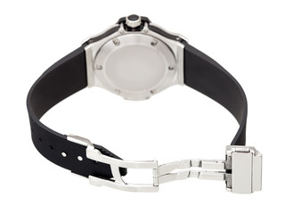 Obraz premium wristwatch with an open lock on a rubber strap of a silver watch back view isolated on white background.