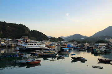 Fototapeta na wymiar the fishing boats park in Lei Yuen Mun fish village , hong kong