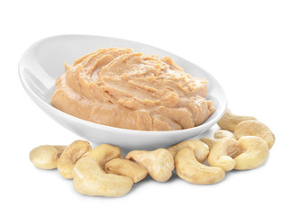 Plate of cashew butter on white background