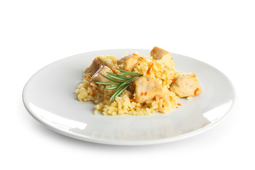 Plate with tasty rice and chicken on white background