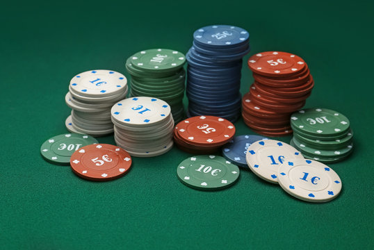 Chips for gambling games on table in casino