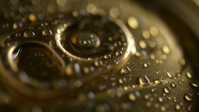 Water on a metal can lid