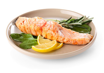 Plate with tasty cooked salmon on white background