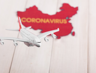 Concept of new chinese corona virus in airplane.