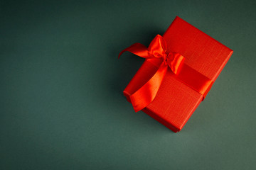 gift in a red festive box, holiday concept, place for your text