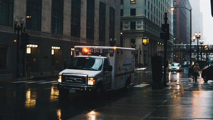 ambulance on a rainy day in a big city © Chance