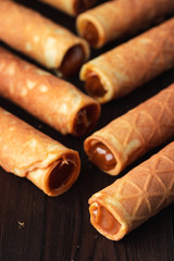 Waffle tubule with boiled condensed milk close up
