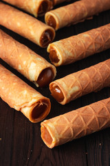 Waffle tubule with boiled condensed milk close up