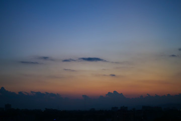 dramatic dusk sky above the town