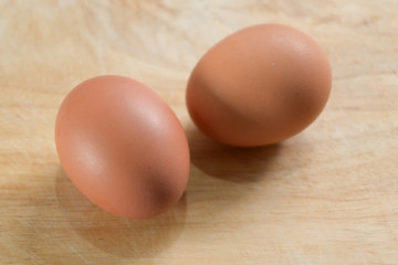 hen egg put on wood cutting board in kitchen prepare cooking