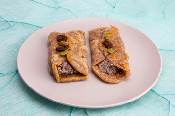 Fried Sorghum pancake with red bean which is called susu bukkumi in Korea