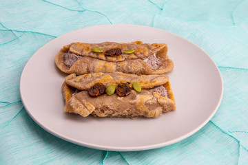 Fried Sorghum pancake with red bean which is called susu bukkumi in Korea