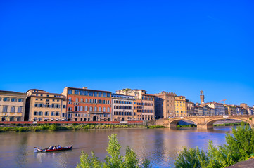 Fototapeta na wymiar A view along the Arno River in Florence, Italy.