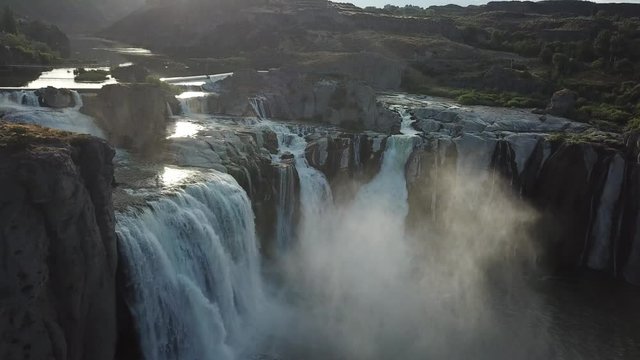 Stunning Breathtaking Shoshone Falls, Drone Aerial View. Snake River Waterfall On Golden Hour Sunlight and Water Mist, Idaho USA