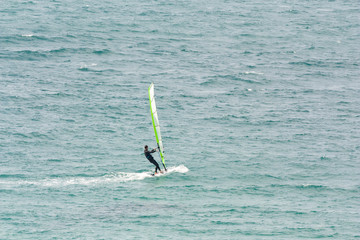 windsurfing on the background of the sea