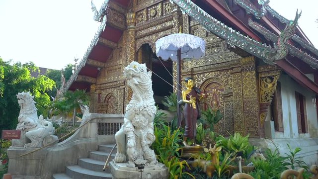 Beautiful White Chinthes in the entrance of a traditional Prayer Room&acute;s Temple in Chiang Mai, Thailand.