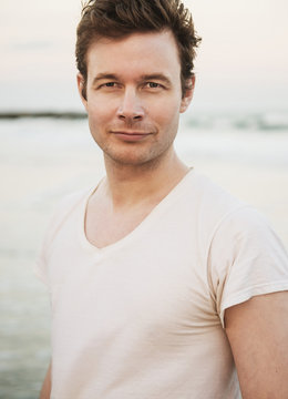 Portrait Of Young Man At The Beach