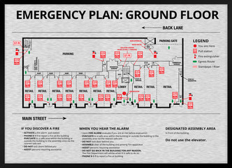 Emergency plan or egress plan. Brushed metal. Map of residential / strata building with retail stores and parking on ground floor. Detailed text instruction for residents in case of an emergency.  © Petra Richli
