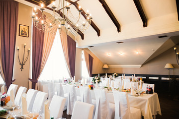 Interior of a restaurant prepared for wedding ceremony