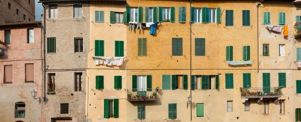 Exterior of residential building in Siena, Tuscany, Italy