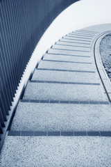 Closeup of spiral stairway. Building abstract background