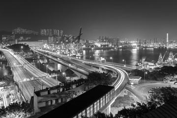 Cargo port and highway in Hong Kong city at night