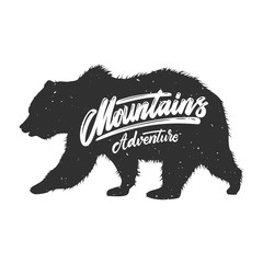 Naklejka na ściany i meble Mountains adventure. Silhouette of grizzly bear on grunge background. Design element for poster, card, banner, sign. Vector illustration