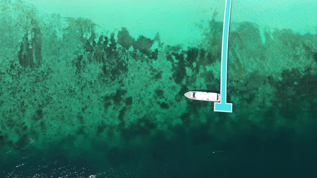 Footage B-roll of Aerial view ocean waves, beach and rocky coastline and beautiful forest. Nyaung Oo Phee Island Myanmar Tropical seas and islands in southern Myanmar. Beautiful tourist attractions.