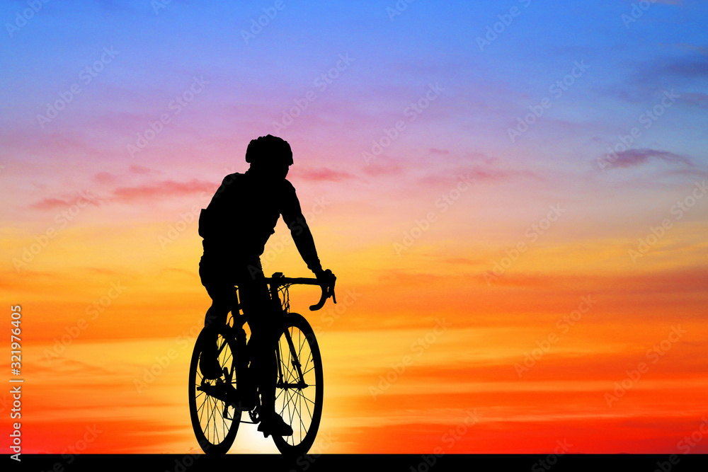 Sticker Silhouette  Cycling  on blurry sunrise  sky   background.