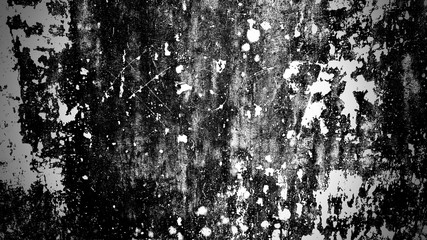 abstract grunge cement wall texture with faded paint. use as a background or wallpaper. black and white, so contrast and grainy.