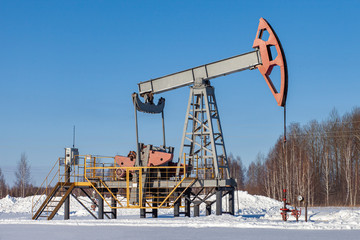 Oil pump in winter. Oil production in the North