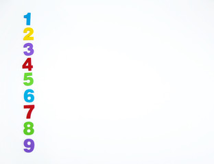 Multi-colored numbers laid out in a row on a white background. A place to copy.