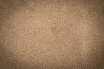 Brown paper, craft abstract background. Retro, old antique vintage paper art pattern texture background. Detail paperboard texture of pattern with free space copy for text, vignette effect.