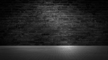 background of an empty black room, a cellar, lit by a searchlight. Brick black wall and wooden floor