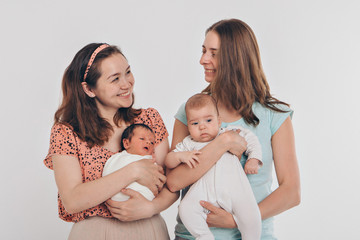 the concept of a healthy lifestyle, the protection of children, shopping - baby in the arms of the mother. Woman holding a child. Isolated on white background. Copy space. 8 march, mother's day
