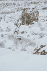 Breathtaking view of Valley in winter season, Cappadocia national park, Turkey. Heavy snow fall during christmas time.