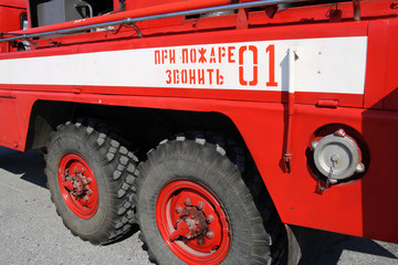 The inscription on the Russian fire truck with the phone of the fire service