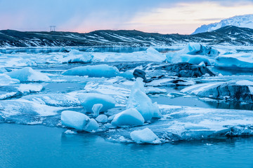Blue Icebergs floating on beautiful Jokulsarlon lagoon Iceland