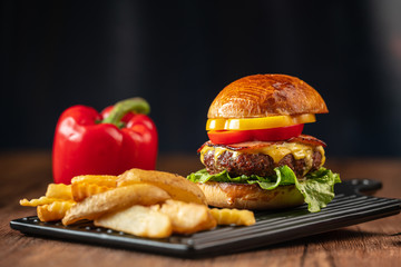 Fresh home-made hamburger served on wood