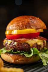 Fresh home-made hamburger served on wood