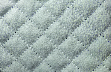 The upholstery of the sofa as an abstract background and texture of the upholstery. Diamond-shaped...