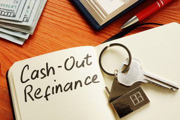 Cash out refinance and key on the notepad. - obrazy, fototapety, plakaty