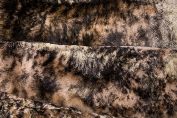 Fur texture close up. Fur on winter women's clothing.